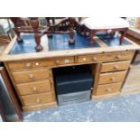 A VICTORIAN PINE DESK.