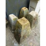 FOUR STADDLE STONE BASES.
