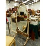 A PAINTED REGENCY STYLE CHEVAL MIRROR.