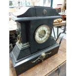 A VICTORIAN SLATE LARGE MANTLE CLOCK AND A WROUGHT IRON ADJUSTABLE CANDLE STAND.