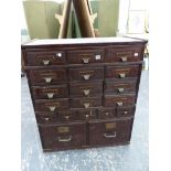 A VINTAGE SHANNON OAK FILE CABINET.