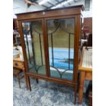 AN EDWARDIAN MAHOGANY INLAID DISPLAY CABINET.