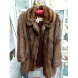 A MAXWELL CROFT LONDON VINTAGE MINK FUR COAT.