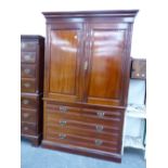 AN LATE VICTORIAN MAHOGANY LINEN PRESS.