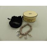 A LINKS OF LONDON SILVER SWEETIE BRACELET COMPLETE WITH FIVE ASSORTED LINKS OF LONDON CHARMS,