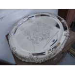 12 LARGE SILVER PLATED PLATTERS WITH ROYAL CRESTS.