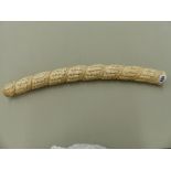 AN EARLY 20TH C. LARGE CARVED IVORY TUSK.