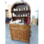 A SMALL OAK COTTAGE DRESSER.