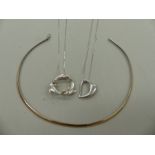 A SILVER TRIPLE DOLPHIN PENDANT AND CHAIN TOGETHER WITH A SILVER BLOWN HEART OPEN PENDANT AND