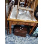 A VICTORIAN PINE KITCHEN TABLE WITH LATER TILED TOP.