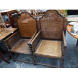 A PAIR OF BERGERE ARMCHAIRS.