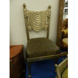 A PAIR OF SILVERED METAL COVERED SIDE CHAIRS.