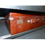 A VINTAGE FAUX CROC SKIN SUITCASE.