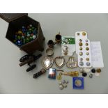 A HUNTLEY AND PALMERS BISCUIT TIN IN THE FORM OF A MOORISH TABLE, A QUANTITY OF MARBLES, AND A SMALL