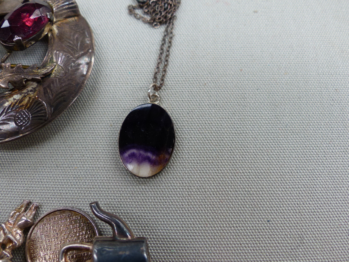 A SILVER CHARM BRACELET, A SILVER SCOTTISH THISTLE BROOCH, AND A BLUE JOHN SILVER CASED PENDANT. - Image 2 of 4