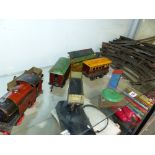 A VINTAGE CLOCK WORK O GAUGE RAILWAY SET.