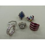 A GROUP OF SIX SILVER AND GEMSET RINGS. FINGER SIZES L. GROSS WEIGHT 46.7grms.
