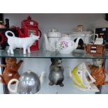 VARIOUS NOVELTY TEAPOTS.