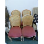 A SET OF FOUR FRENCH STYLE CANE BACK SIDE CHAIRS.