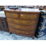 AN EARLY 19TH C. MAHOGANY BOW FRONT CHEST OF TWO SHORT AND THREE LONG DRAWERS.