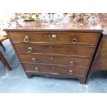 A SMALL GEORGIAN MAHOGANY FOUR DRAWER CHEST.