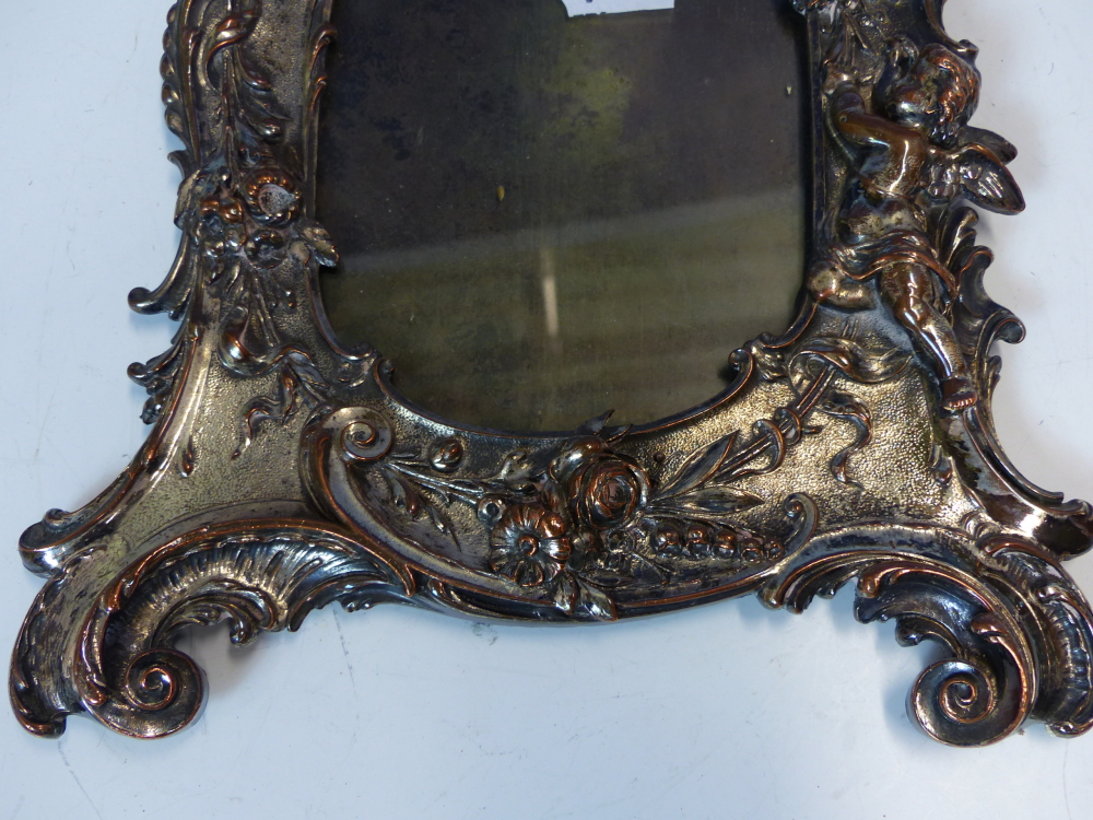 A PAIR OF SILVER ON COPPER EASEL BACKED PHOTOGRAPH FRAMES CAST WITH FLOWERS, AMORINI AND ROCAILLE - Image 10 of 11