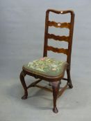 AN EARLY 18th C. MAHOGANY SIDE CHAIR, THE THREE WAVY BAR BACK ABOVE A NEEDLEWORK DROP IN SEAT AND