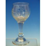 AN 18th C. WINE GLASS, THE GOBLET BOWL WITH LATIN INSCRIPTIONS AFTER TERENCE, AN OVAL OF GRAPES