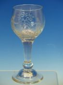 AN 18th C. WINE GLASS, THE GOBLET BOWL WITH LATIN INSCRIPTIONS AFTER TERENCE, AN OVAL OF GRAPES