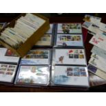 A QTY OF FIRST DAY COVERS LOOSE AND IN ALBUMS