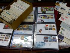 A QTY OF FIRST DAY COVERS LOOSE AND IN ALBUMS