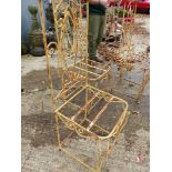 A SET OF EIGHT WROUGHT IRON PATIO CHAIRS.