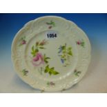 A NANTGARW PLATE PAINTED WITH CENTRAL MORNING GLORY AND A PINK ROSE FURTHER BUDS AND OPEN ROSES ON