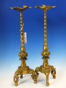 A PAIR OF CHINESE POLISHED BRONZE PRICKET CANDLESTICKS, THE LOTUS LEAF DRIP PANES WITH FROGS TO