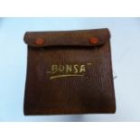 A LEATHER CASED SET OF ELEVEN BONSA TOOLS