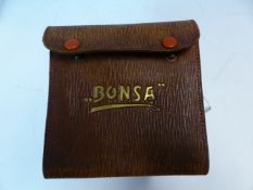 A LEATHER CASED SET OF ELEVEN BONSA TOOLS