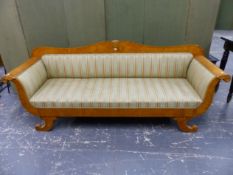 A BIEDERMEIER STYLE SATIN WOOD SETTEE, THE SHOW FRAME BACK SCROLLING TO A CENTRAL FAN, ROSETTES