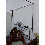 A WROUGHT IRON HALF TESTER DOUBLE BED. W 157 x D 195cms.