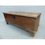 AN 18th C. OAK COFFER WITH SINGLE PLANK LID AND SIDES ABOVE BRACKET FEET. W 118 x D 37 x H 47.5cms.