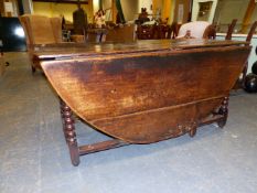 AN 18th C. OVAL FLAP TOP DINING TABLE ON BOBBIN TURNED LEGS AND CONJOINING STRETCHERS. W 159 x D