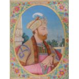 A LARGE 19th.C. INDIAN WATERCOLOUR. AN OVAL PROFILE PORTRAIT OF A PRINCELY RULER HOLDING A SWORD.