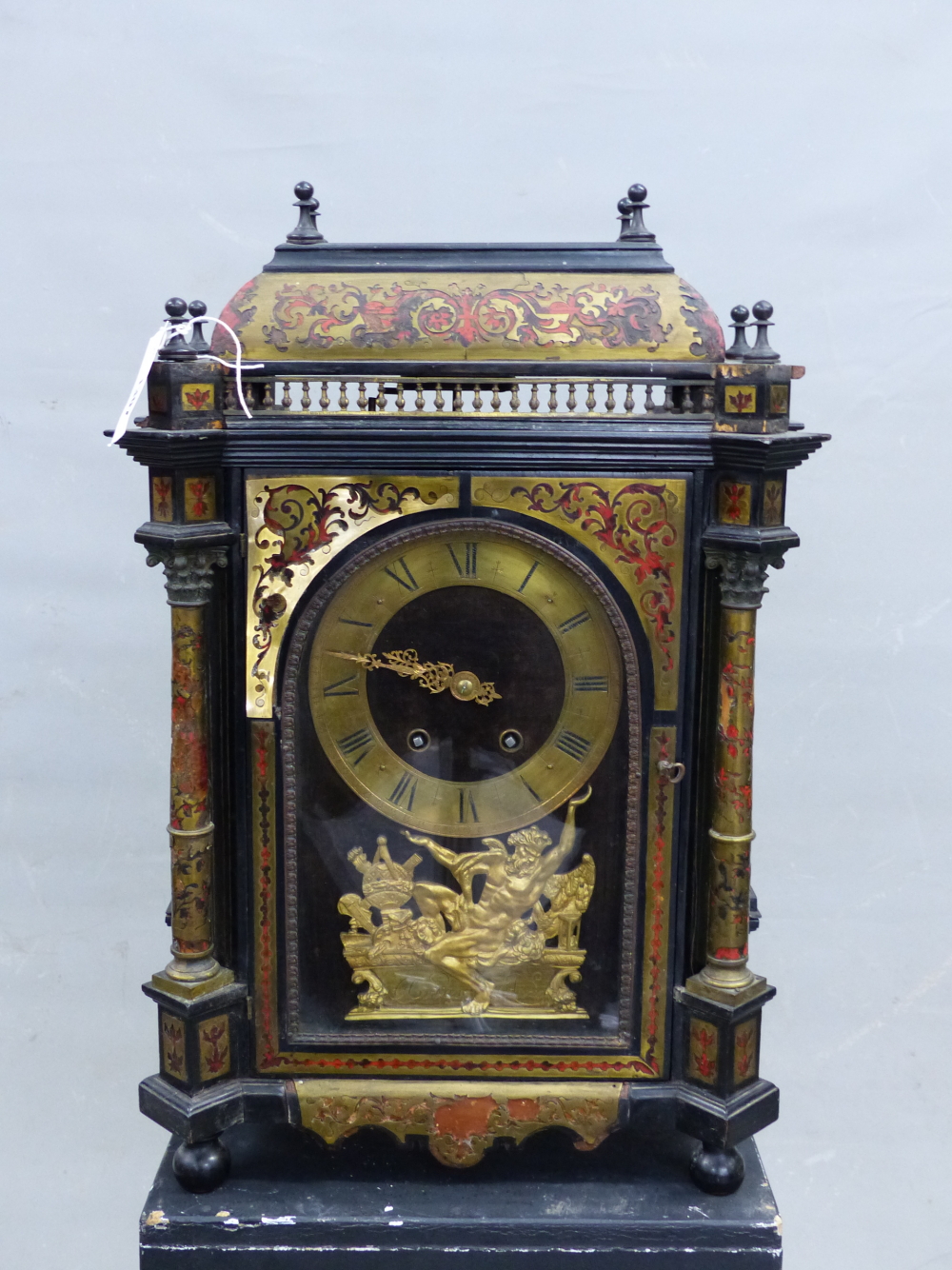 AN 18th C. AND LATER BOULLE CASED MANTEL CLOCK SIGNED J ARTUS PARIS BELOW A FIGURE OF ATLAS