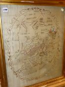 A LATE 18th/EARLY 19th C. SILK WORK MAP OF ENGLAND AND WALES WORKED WITHIN AN OVAL OF FLOWERING