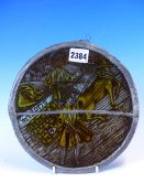 A LEADED STAINED GLASS ROUNDEL PAINTED WITH TWO MEDIAEVAL FIGURES, ONE DRIVING A HORSE DRAWN