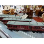 A RAKE OF FOUR GAUGE 1 PRESTIGE 10 LMS COACHES CONTAINED IN TRANSIT CASE, PLUS ORIGINAL BOXES.