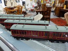 A RAKE OF FOUR GAUGE 1 PRESTIGE 10 LMS COACHES CONTAINED IN TRANSIT CASE, PLUS ORIGINAL BOXES.