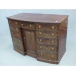 AN EARLY 19TH CENTURYBOW FRONTED SIDEBOARD, THE CENTRAL DRAWER AND RECESSED CUPBOARD FLANKED BY