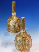 A PAIR OF EARLY 20th C. SATSUMA POTTERY BOTTLE VASES, EACH PAINTED WITH FIGURES ALTERNATING WITH