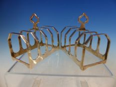 A PAIR OF HALLMARKED SILVER FOUR SLICE TOAST RACKS, DATED 1937 SHEFFIELD FOR VINERS'S LTD. GROSS