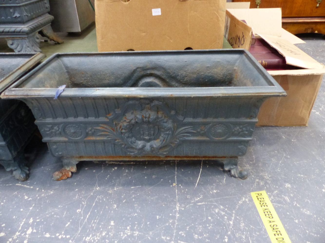 A HARLEQUIN SET OF SIX ANTIQUE IRON PLANTERS, THE RECTANGULAR RIMS OVER FLUTED BANDS AND CENTRAL - Image 2 of 11